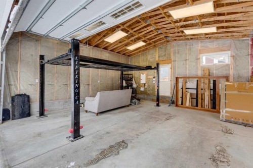 98 Magnolia Square Se, Calgary, AB - Indoor Photo Showing Basement