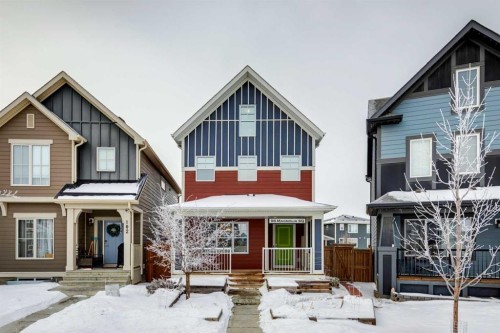 98 Magnolia Square Se, Calgary, AB - Outdoor With Deck Patio Veranda With Facade