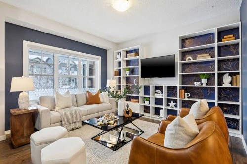 98 Magnolia Square Se, Calgary, AB - Indoor Photo Showing Living Room