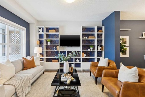 98 Magnolia Square Se, Calgary, AB - Indoor Photo Showing Living Room