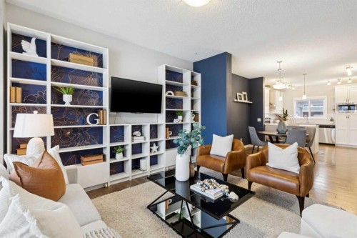 98 Magnolia Square Se, Calgary, AB - Indoor Photo Showing Living Room