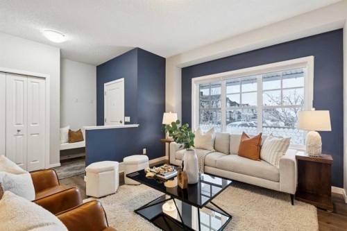 98 Magnolia Square Se, Calgary, AB - Indoor Photo Showing Living Room