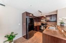 5103-69 Country Village Manor Ne, Calgary, AB  - Indoor Photo Showing Kitchen With Double Sink 