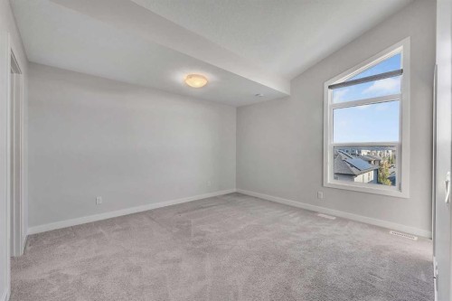 34 Sage Bluff Heights Nw, Calgary, AB - Indoor Photo Showing Other Room