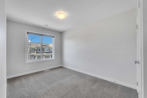 34 Sage Bluff Heights Nw, Calgary, AB - Indoor Photo Showing Other Room