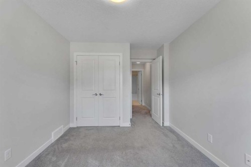 34 Sage Bluff Heights Nw, Calgary, AB - Indoor Photo Showing Other Room