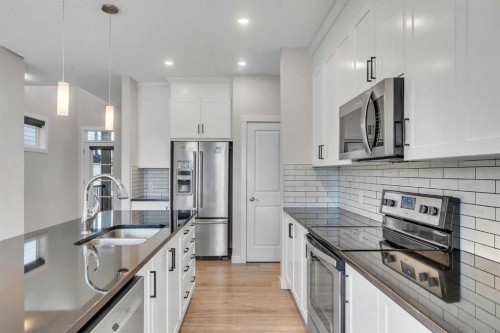 34 Sage Bluff Heights Nw, Calgary, AB - Indoor Photo Showing Kitchen With Stainless Steel Kitchen With Upgraded Kitchen