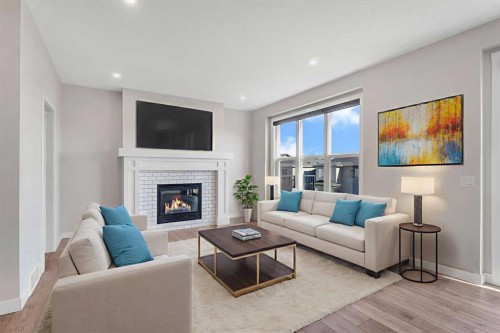 34 Sage Bluff Heights Nw, Calgary, AB - Indoor Photo Showing Living Room With Fireplace
