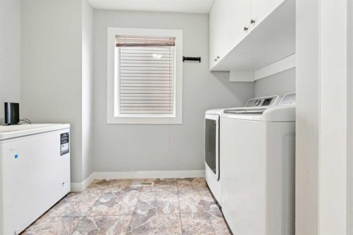 206 Bridlecreek Green Sw, Calgary, AB - Indoor Photo Showing Laundry Room