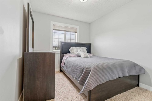 206 Bridlecreek Green Sw, Calgary, AB - Indoor Photo Showing Bedroom