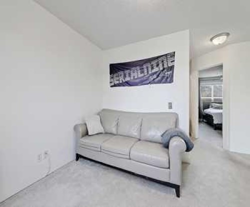 7 Prestwick Crescent Se, Calgary, AB - Indoor Photo Showing Living Room