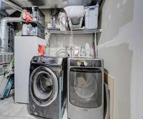 7 Prestwick Crescent Se, Calgary, AB - Indoor Photo Showing Laundry Room