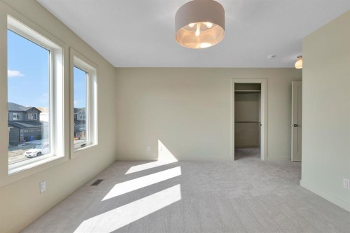 92 Fireside Common, Cochrane, AB - Indoor Photo Showing Other Room