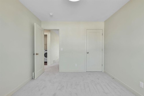 92 Fireside Common, Cochrane, AB - Indoor Photo Showing Other Room