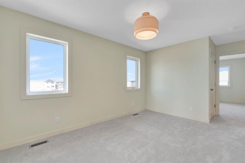 92 Fireside Common, Cochrane, AB - Indoor Photo Showing Other Room