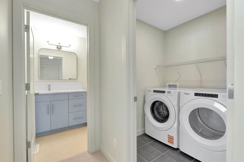 92 Fireside Common, Cochrane, AB - Indoor Photo Showing Laundry Room