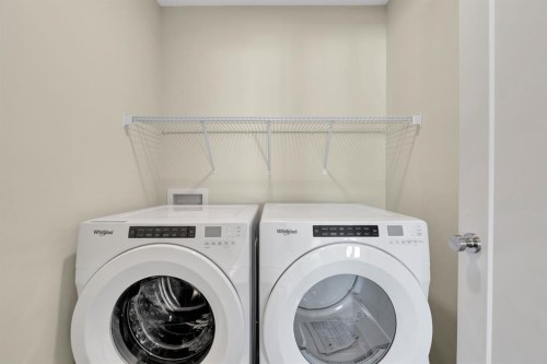 92 Fireside Common, Cochrane, AB - Indoor Photo Showing Laundry Room