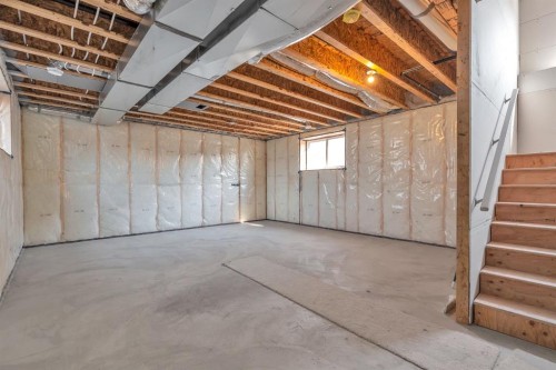 92 Fireside Common, Cochrane, AB - Indoor Photo Showing Basement