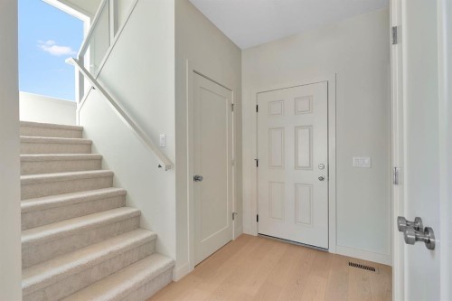 92 Fireside Common, Cochrane, AB - Indoor Photo Showing Other Room