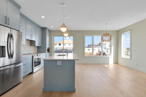 92 Fireside Common, Cochrane, AB - Indoor Photo Showing Kitchen With Stainless Steel Kitchen With Upgraded Kitchen