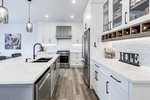 714 Mandalay Link, Carstairs, AB - Indoor Photo Showing Kitchen With Double Sink With Upgraded Kitchen