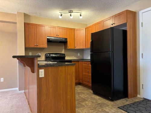 3303-60 Panatella Street Nw, Calgary, AB - Indoor Photo Showing Kitchen