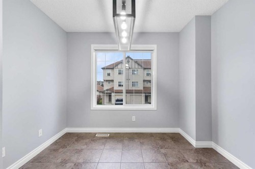 118 Copperfield Lane Se, Calgary, AB - Indoor Photo Showing Other Room