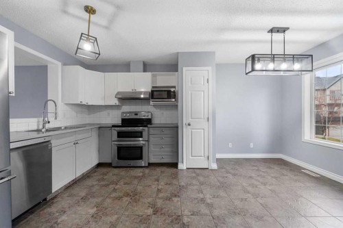 118 Copperfield Lane Se, Calgary, AB - Indoor Photo Showing Kitchen