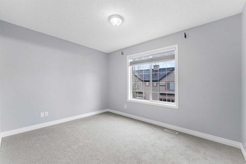 118 Copperfield Lane Se, Calgary, AB - Indoor Photo Showing Other Room