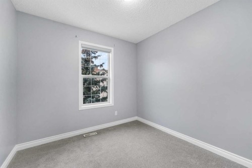 118 Copperfield Lane Se, Calgary, AB - Indoor Photo Showing Other Room