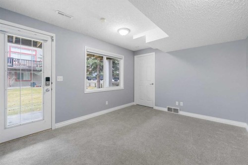 118 Copperfield Lane Se, Calgary, AB - Indoor Photo Showing Other Room