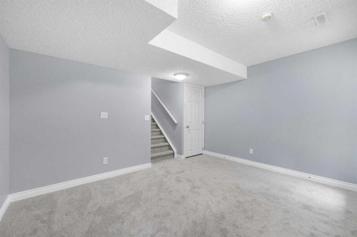 118 Copperfield Lane Se, Calgary, AB - Indoor Photo Showing Other Room