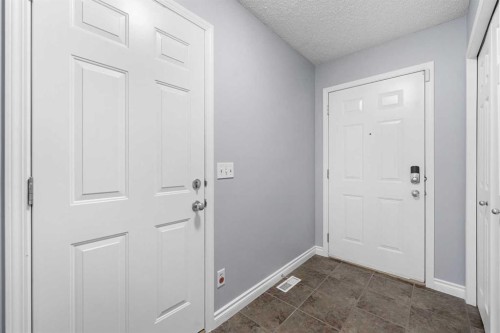 118 Copperfield Lane Se, Calgary, AB - Indoor Photo Showing Other Room