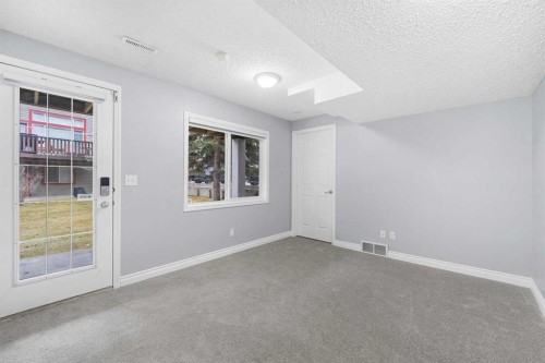 118 Copperfield Lane Se, Calgary, AB - Indoor Photo Showing Other Room