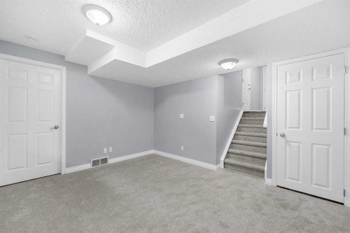 118 Copperfield Lane Se, Calgary, AB - Indoor Photo Showing Other Room