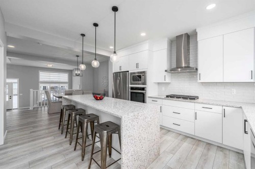 89 Magnolia Grove Se, Calgary, AB - Indoor Photo Showing Kitchen With Upgraded Kitchen
