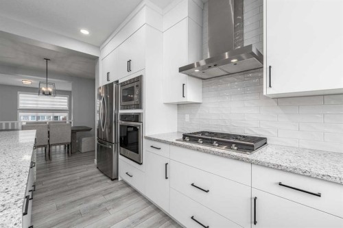 89 Magnolia Grove Se, Calgary, AB - Indoor Photo Showing Kitchen With Upgraded Kitchen