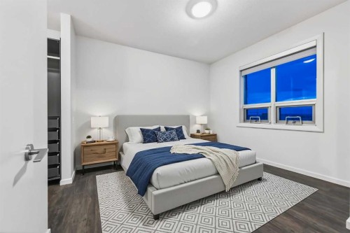1601-1410 1 Street Se, Calgary, AB - Indoor Photo Showing Bedroom