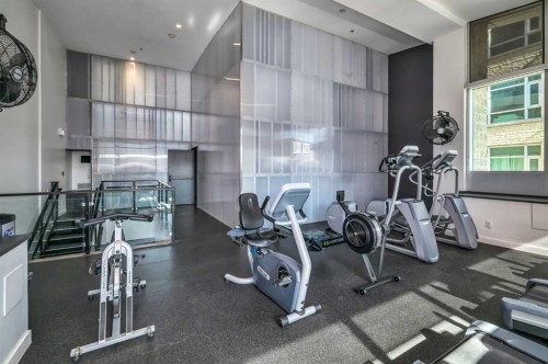 1601-1410 1 Street Se, Calgary, AB - Indoor Photo Showing Gym Room