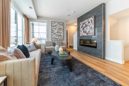 1006-60 Howse Lane Ne, Calgary, AB - Indoor Photo Showing Living Room With Fireplace