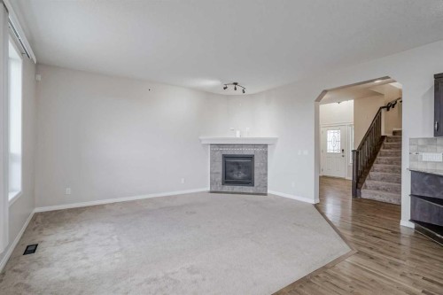 206 Pantego View Nw, Calgary, AB - Indoor Photo Showing Living Room With Fireplace