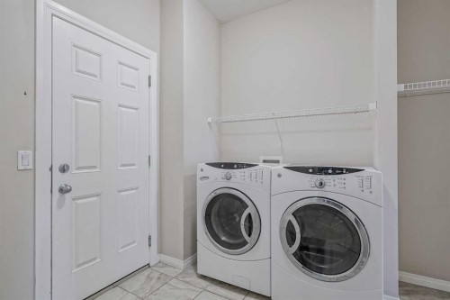 206 Pantego View Nw, Calgary, AB - Indoor Photo Showing Laundry Room