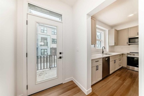 103-30 Rochester View Nw, Calgary, AB - Indoor Photo Showing Kitchen