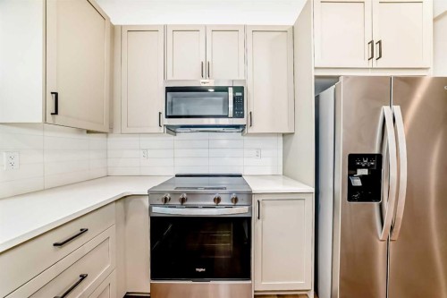 103-30 Rochester View Nw, Calgary, AB - Indoor Photo Showing Kitchen