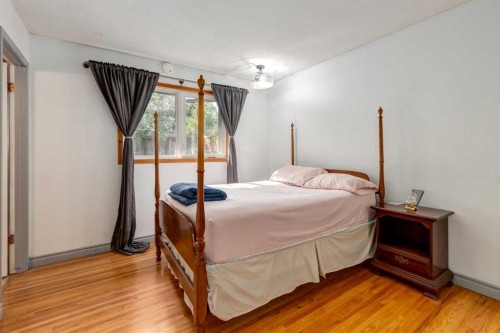 7103 Hunterwood Road Nw, Calgary, AB - Indoor Photo Showing Bedroom