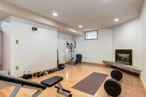 7103 Hunterwood Road Nw, Calgary, AB - Indoor Photo Showing Gym Room