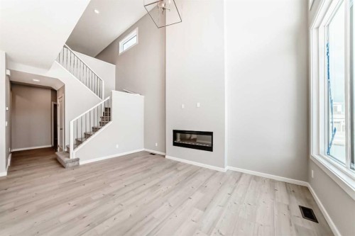 182 Walgrove Manor Se, Calgary, AB - Indoor Photo Showing Other Room With Fireplace