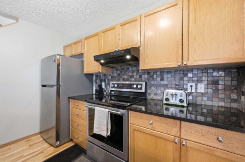 52 Panatella Gate, Calgary, AB - Indoor Photo Showing Kitchen With Stainless Steel Kitchen