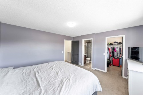 84 Cimarron Grove Close, Okotoks, AB - Indoor Photo Showing Bedroom