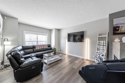 84 Cimarron Grove Close, Okotoks, AB - Indoor Photo Showing Living Room